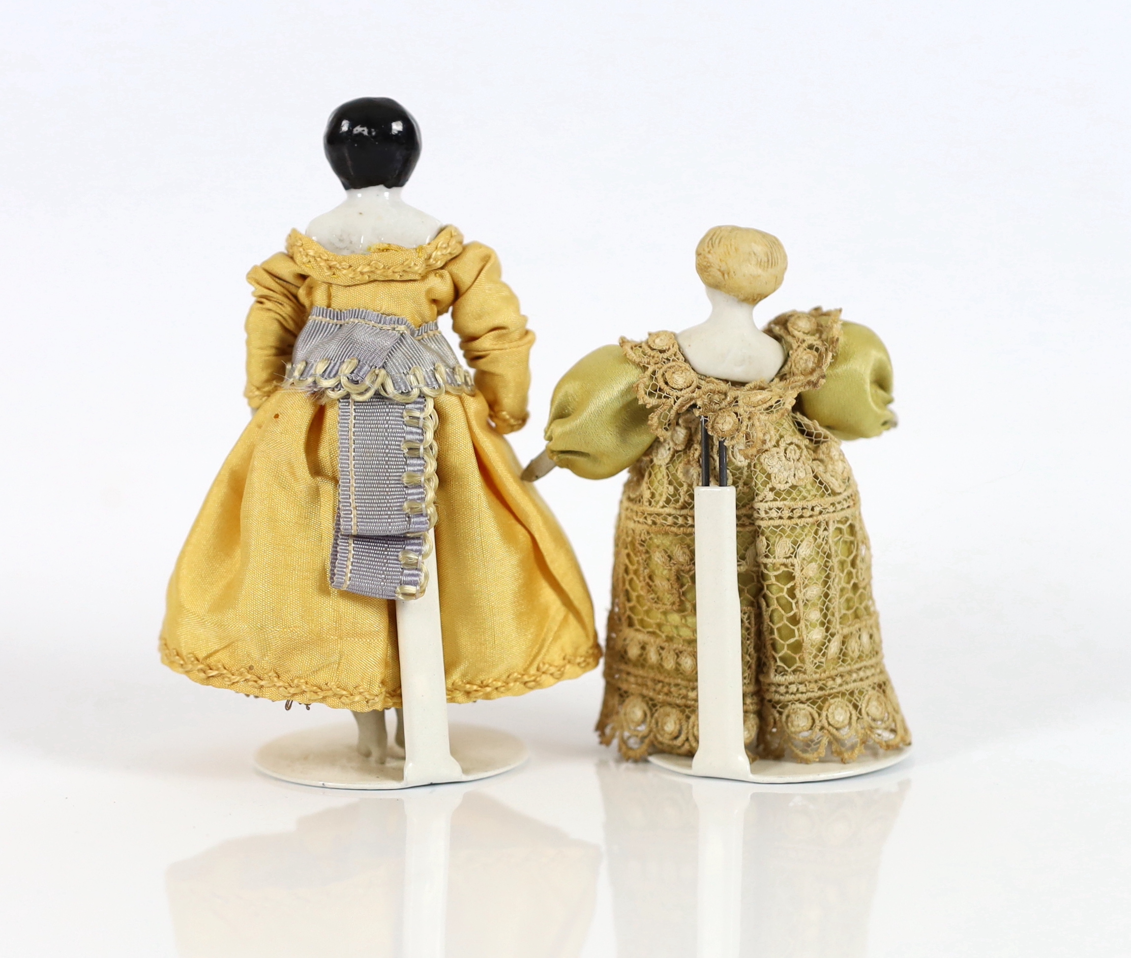 Two Doll's House dolls, c.1860, 10cm and 8cm